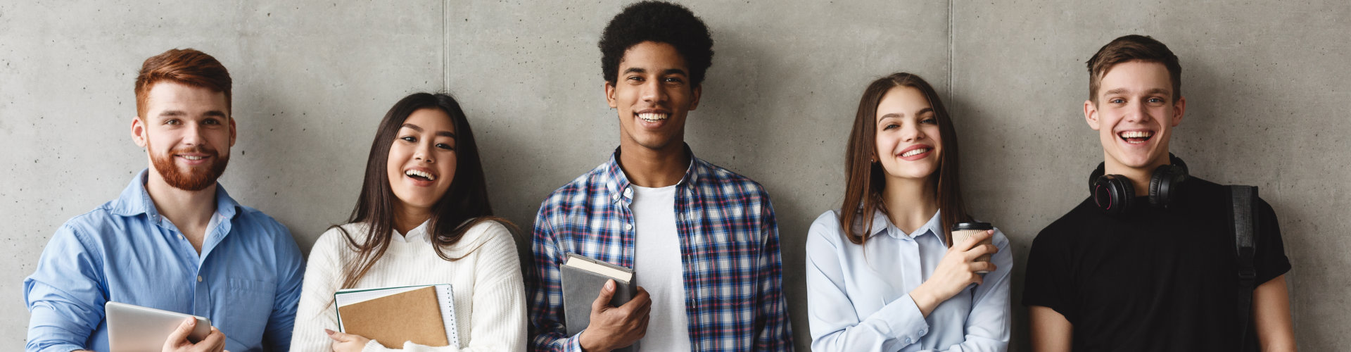 students smiling at the camera